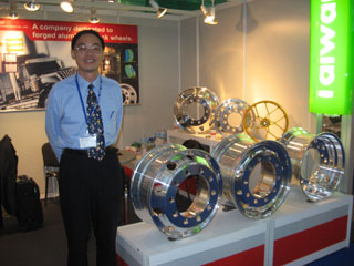 Canon Hsu, marketing and sales manager, and Fullchamp`s stylish forged truck wheels. 