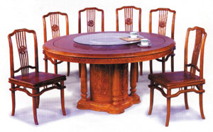 The traditional round dining table with six chairs is a rarity in Forest Prospect`s line.