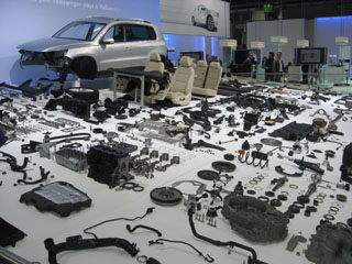 VW shows visitors the number of parts on a compact car. 
