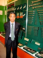 Joseph Liao, president of Jonnesway, stands by his company's high-end, professional Jonnesway auto tools.