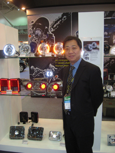 Dany Chen, president of Giantlight, pictured with the company`s exhibits.