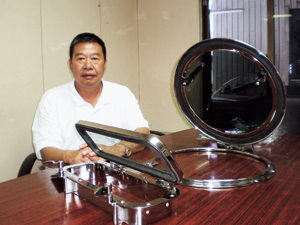Ali Huang, general manager of Man Ship, proudly introduces Modern Deck Hatch.