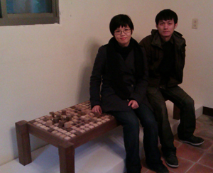 Young designers A-Dan Jhan (right) and Constance Chen (left) and their “Decoding Bench.” 