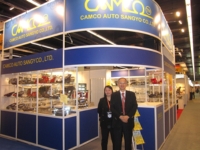 Bruce Liu (right), chairman of Camco, and his company's booths at Automechanika Frankfurt, the world's largest auto-parts trade fair.