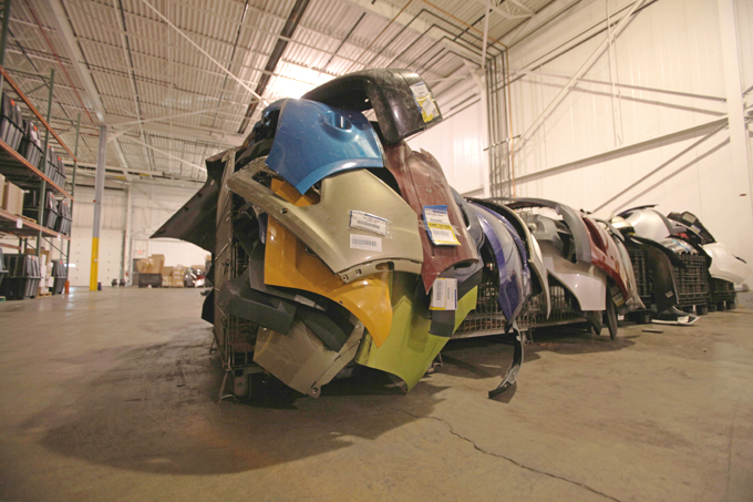 Replaced vehicle bumpers at Ford’s used-parts collection point. 
(Photo courtesy of Ford) 