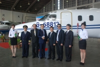  J.T. Liu (fourth from left), AIDC's chairman, announces AIDC's venture into biz-jet leasing and charter service in front of a Astra Spx business jet.
