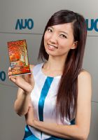 A model holds AUO's mass-produced 6-inch WQHD smartphone panel.