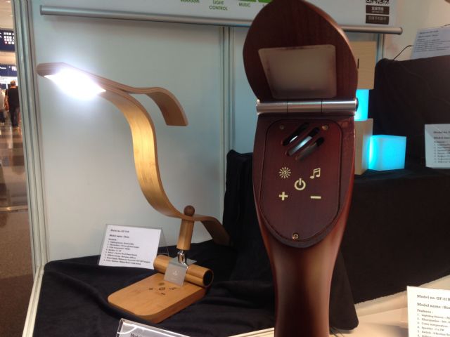 Elegant & Simply Wireless Speaker with Dimmable LED Lighting (left) demonstrated by Green First Corporation of Taiwan.