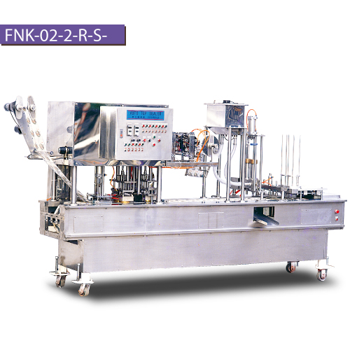 AUTOMATIC FILLING AND SEALING MACHINE