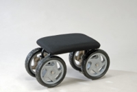 Garden cart with padded seat on wheels