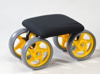 Garden cart with padded seat on wheels