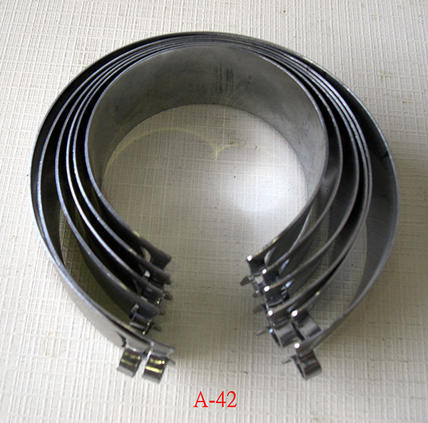 Piston spring sleeve