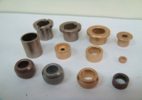 Self-lubricating sintered bushing