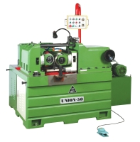 Hydraulic thru feed type thread rolling machine