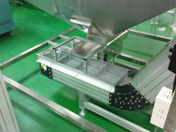 Conveyor System for Bottle Cap