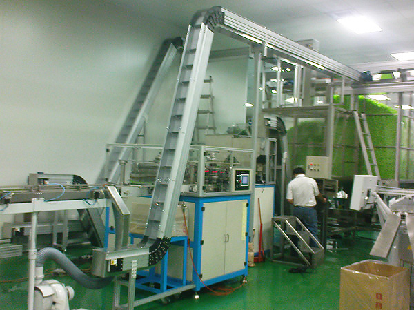 Conveyor System for Bottle Cap