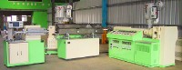 DUAL LAYERS EXTRUDING  & CUTTING MACHINE